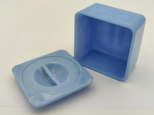 This rare antique is a sky blue square glass dish with a detachable lid. It has a small concave handle on top of the lid.  Approximately 4&quot;x4&quot;x3&quot; Tall.